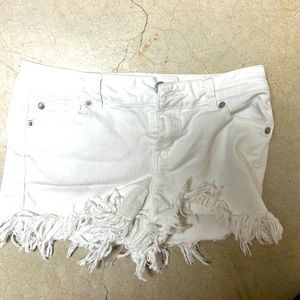 White Jean shorts cut at the end